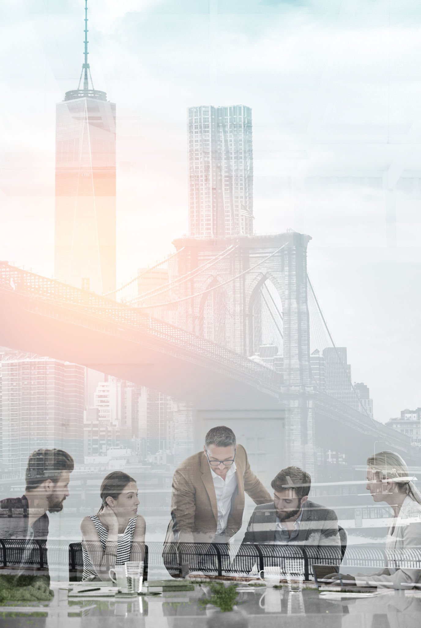 Multiple exposure shot of colleagues having a meeting superimposed over a city background